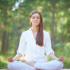 concentrated-woman-meditating-nature-scaled.jpg